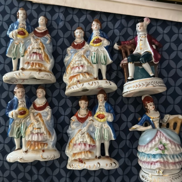 Collection of hand-painted porcelain figurines from the 